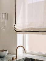 Load image into Gallery viewer, Linen Roman Blinds in off-whhite colour with black piping
