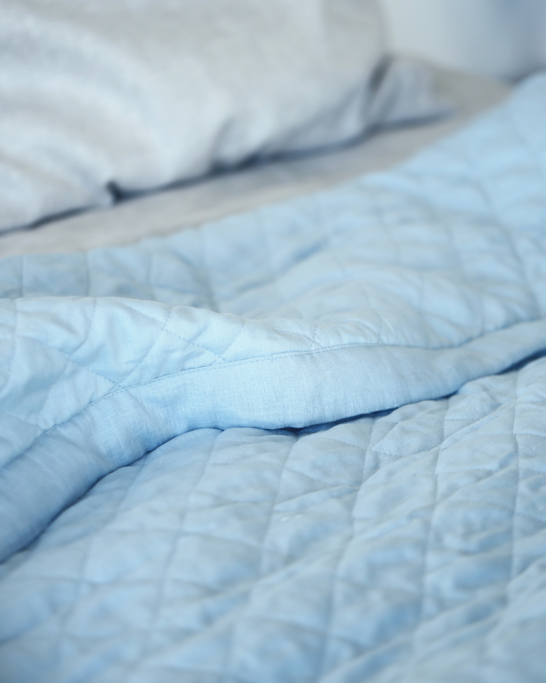 Quilted linen duvet in dusty blue